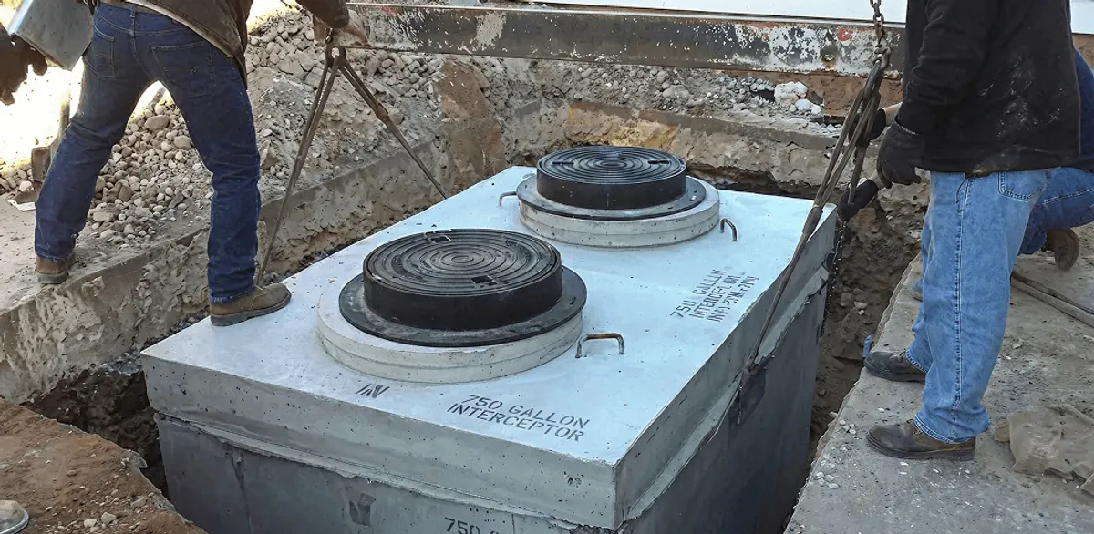 Grease trap installation for a commercial property drainage system in Cleveland, OH