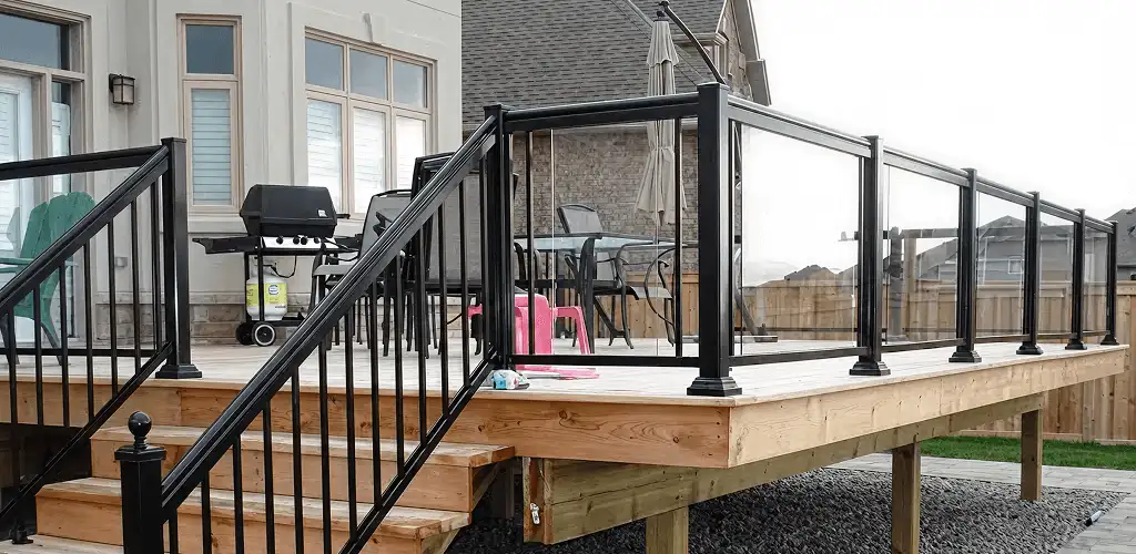 Handrail installation on a deck staircase for safety and code compliance in Cleveland, OH